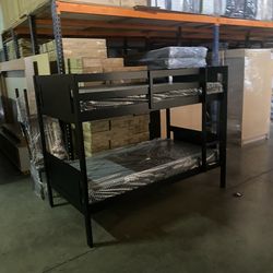 Full over Full bunk bed. Dark walnut,grey & white-$499. Full mattresses -$125.00 each. Assembly not included. Taxes included. Free delivery.  Se habla