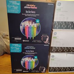 5 BOXES OF ICICLES LIGHTS / BLOW UP SANTA/80.00
