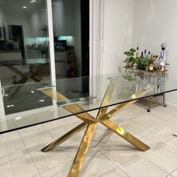 Modern Glass Dining Table with Gold Starburst Base