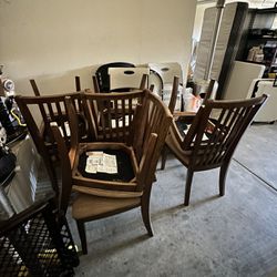 8 Like New Wooden Chairs 