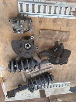 Alternator, struts, wheel hub