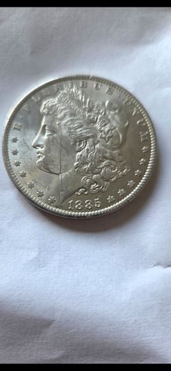 1885 o Morgan silver dollar unc