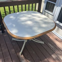 41 x 41” table cream colored formica wood trim with leaf