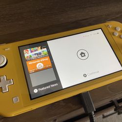 Nintendo Switch Lite (Yellow) + Charger