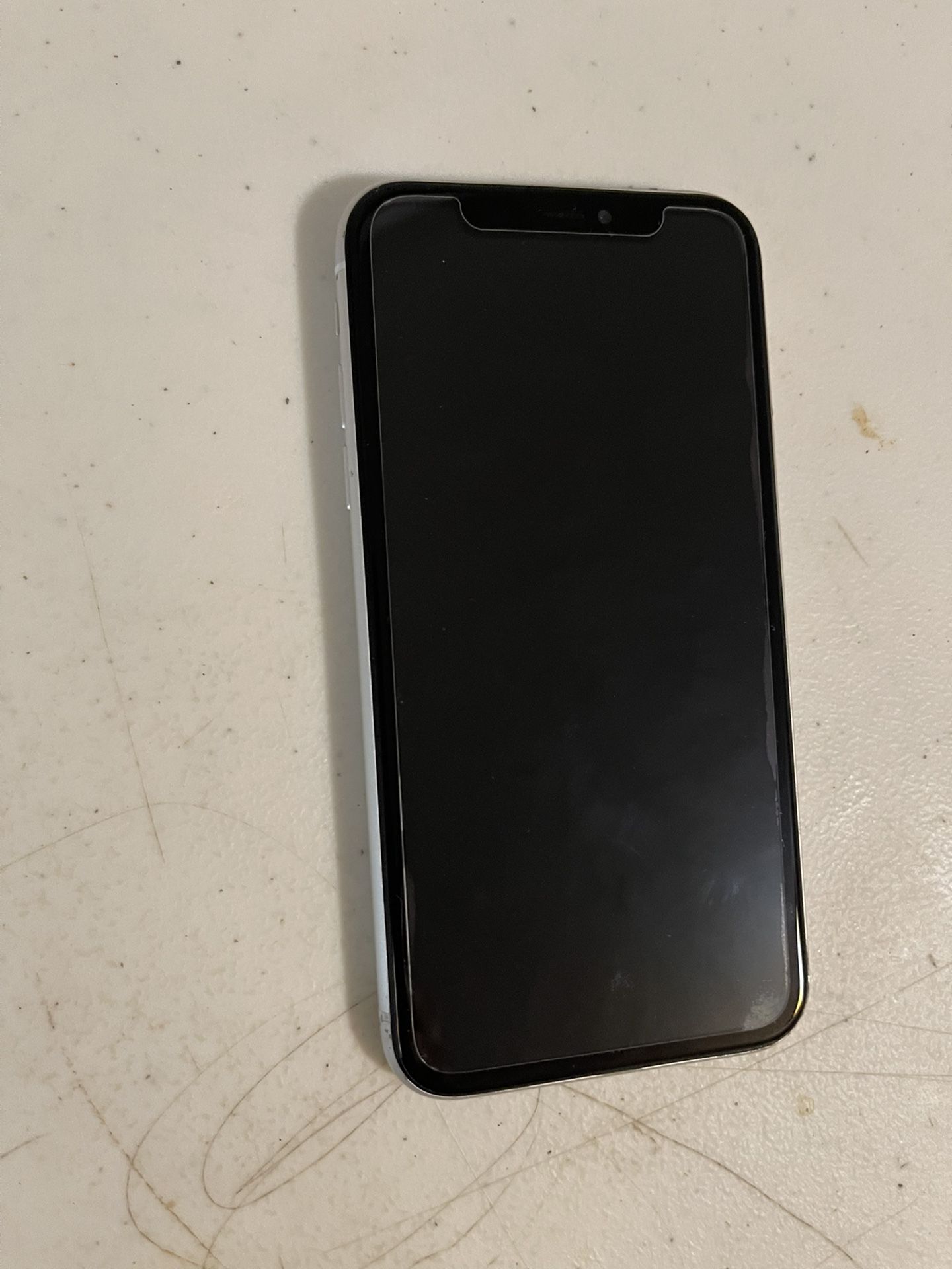 Apple iPhone XR 64 GB T-mobile By metro pc color white. Work very well. Perfect condition.