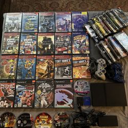 Ps2 With Controllers And Lots Of Games