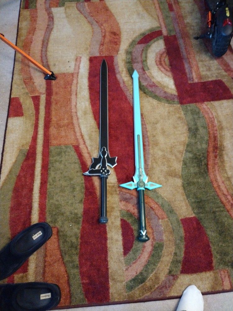 two nerd sticks.  SAO repulser and elucidator 
