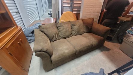 Brown microfiber hide a bed