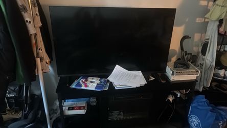 Tv and tv stand with digital fireplace