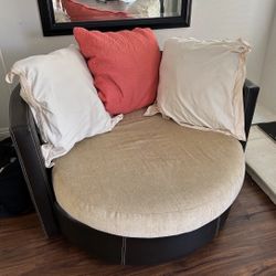 swivel chair with comfy pillows 