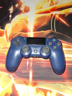 PS4 CONTROLLER BLUE MODEL #CUH-ZCT2U...USED WITH A LEFT  STICK DRIFT...ALL OTHER BUTTONS WORKS AND HOLDS A CHARGE...SMOKE FREE HOME...$20