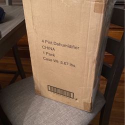 Dehumidifier.  Wt: 5.67  Lbs.  Brand new never been took it out the box