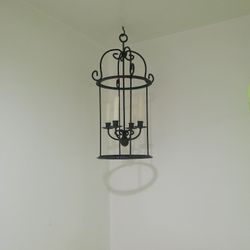 23 inch tall black metal candle garden chandelier.