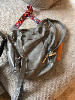 Grey brown and black backpack purse
