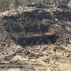 Unprocessed soil 35 a bobcat scoop