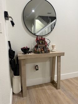 Entry table and mirror