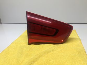 2015-2016 Kia Sportage left tail light trunk lid. OEM