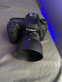 Canon EOS 80D DSLR camera with Canon 50mm lens.