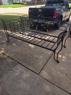Metal twin bed frame.