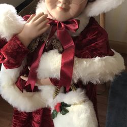 Santa’s Best Animated Porcelain Doll