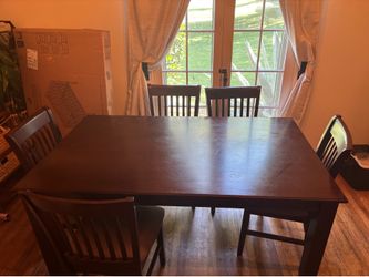 Dark brown dining table