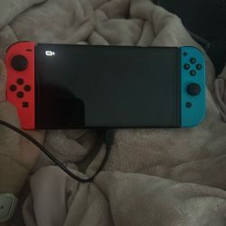 LIGHTLY USED NINTENDO OLED
