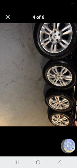 Nissan Altima OEM 16 inch Rims and Tires Solid Aluminum Lug pattern 5x114.3mm