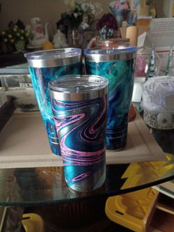 Two 32 oz  tervise tumblers one 20 oz