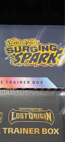 Surging sparks etb sealed new pokemon