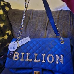 Rhinestone Billion bag that has sleeve in back to go on your luggage trolley.