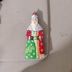 hand-carved and hand-painted wooden figurine of Ded Moroz