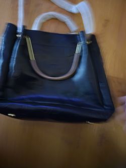 Brand new never used large decorative black purse as seen on tick tock with insert that comes out