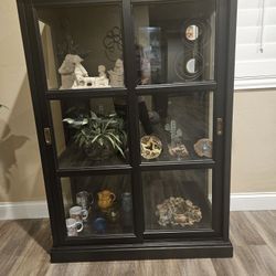 IKEA Cabinet... Multifunctional!  Black wood w/sliding Glass Doors