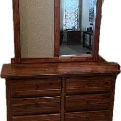 Dresser With Mirror, Peg board next to mirror.