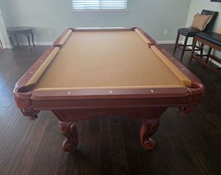 Pool table and pool sticks ball set