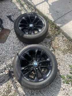 Two Black BMW rims