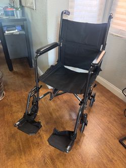 Black Transport Wheelchair with Footrests