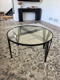 Round glass coffee table