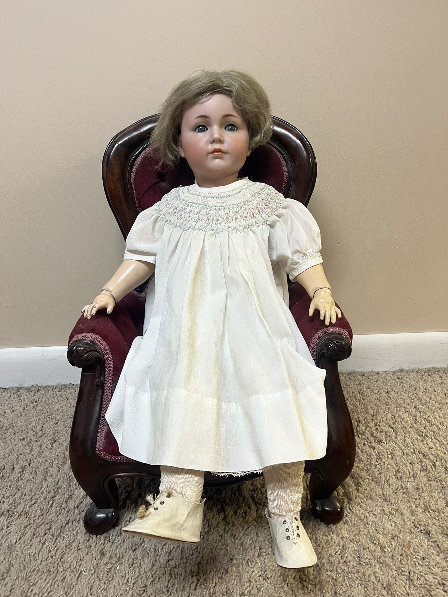Antique Porcelain Doll with Chair