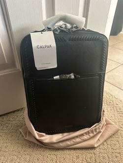CALPAK Black Carry-On Luggage with Tags