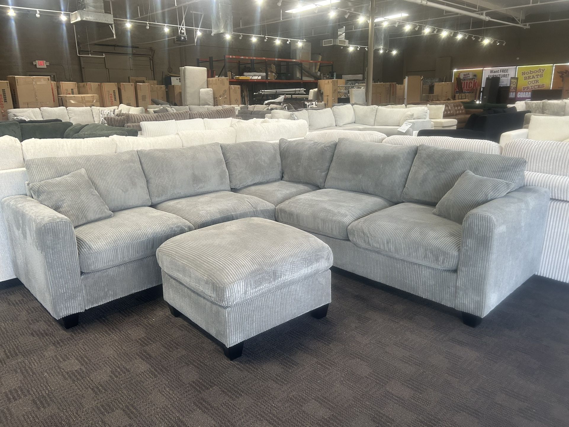 Gray Comfy Sectional And Ottoman