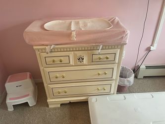 Chest of draws and changing pad and lamp