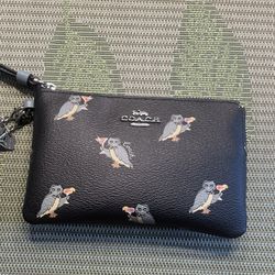 Coach owl best sale wristlet