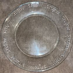 vintage clear glass plate with snow written around edges