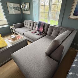 Gray MCM style sectional that can be divided