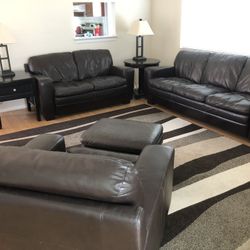 Living Room Set:  Sofa , Love Seat , Chair With Hassack, End Tables & Carpet . Brown Genuine Leather . Excellent Condition .