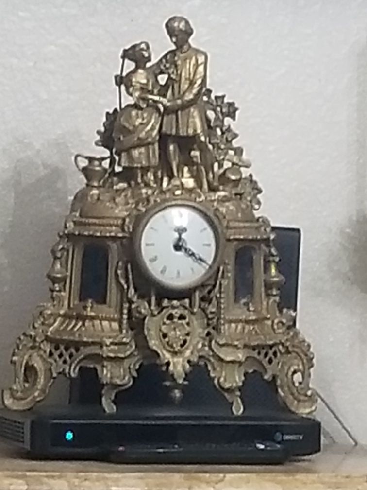 Reloj de bronze