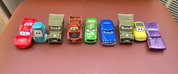 Vintage Disney Pixar Cars 9-Piece Plastic Figure Lot - McQueen, Mater, & more collection pieces