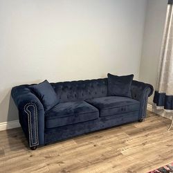 Blue velvet couch and loveseat