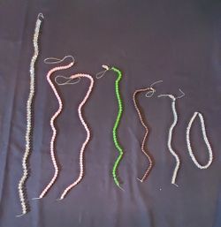 STRINGS OF BEADS